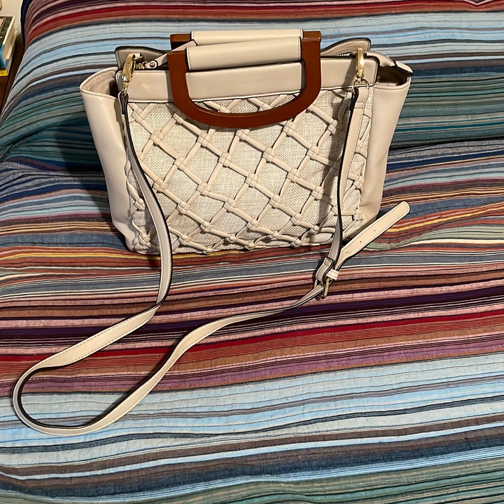 Crossbody satchel with wooden handles and crossbody strap